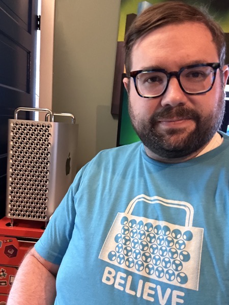 a selfie of me wearing the Mac Pro 'believe' shirt designed by John Siracusa, with my Mac Pro in the background