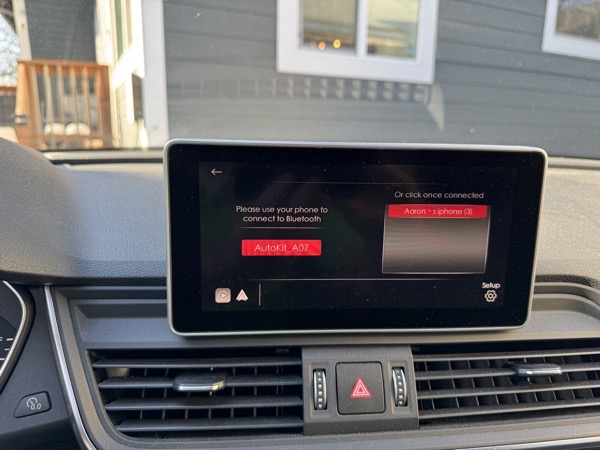 my car's infotainment screen displaying the CarlinKit's connection interface, showing that you can choose from a list of connected Bluetooth phones